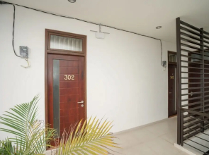 Oyo 932 Griya Mas Residence Syariah