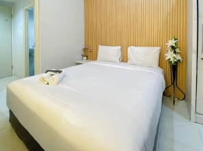 Nice And Cozy Studio At Amartha View Apartment