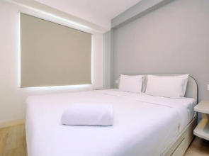 Minimalist and Warm 2BR at 29th Floor Podomoro Golf View Apartment