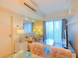 Modern and Comfortable 1BR at Casa Grande Apartment By Travelio
