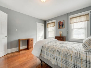 Centrally Located Albion Home With Screened Porch!