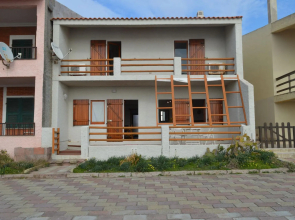 Seafront holiday home twenty meters from the western shore of Sardinia in S'archittu Beach-Casa del Giglio