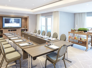 Отель Naumi Dubai