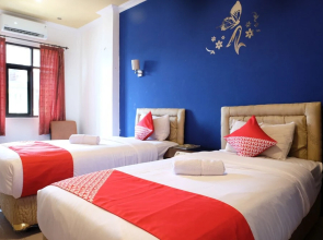 Oasis Hotel by OYO