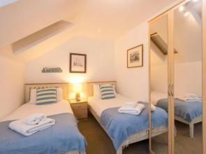 The Beach House & Porth Sands Apartments