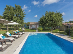 Holiday House with pool, garden, playground and BBQ - surrounded by nature