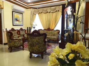 The Executive Villa Inn & Suites