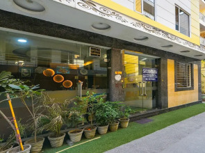 FabHotel Baba Residency