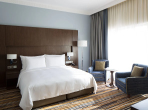 Отель Naumi Dubai