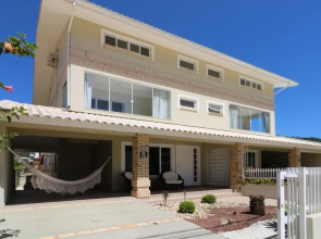 Casa show a 1 minuto a pé da praia PalmasBNB