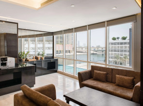 Отель Radisson Blu Hotel, Dubai Canal View