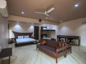 SaffronStays Aura, 4 BR Luxury Pool Villa with Game Room & Lawn