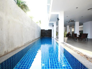 One World One Home Naiharn Hotel