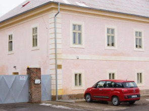 Apartmány u komína