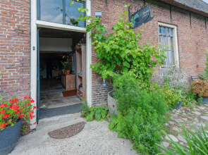 Farmhouse by Lauwers River With Rowing Boat