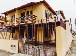 Casa a 300 metros da praia do Centro - WIFI 200MB - Netflix - 2 Quartos - Cozinha equipada - Churrasqueira - Pet friendly - Quintal