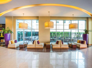 Отель Novotel Suites Mall Avenue Dubai