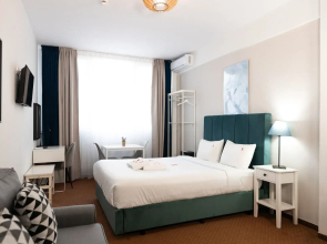 City Plaza Apartments & Rooms