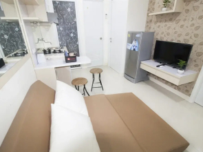 2BR Green Pramuka City Apartment by Travelio