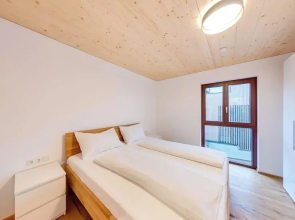 Urban-Apartmenthaus zwischen Berg und See