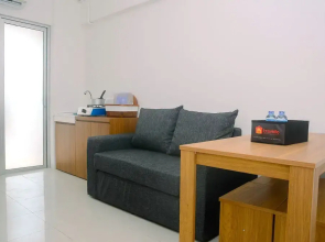 2BR Minimalist Bassura City Apartment By Travelio