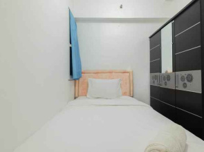 New Furnished 2BR at Mutiara Bekasi Apartment By Travelio