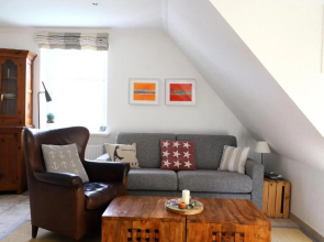 Neuerbautes Haus im Friesenstil. Moderne 2-Zimmer-Appartements mit Balkon für bis zu 4 Personen
