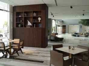 Отель Mövenpick Jumeirah Village Triangle