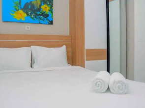 Elegant and Comfy 2BR above Mall at Bassura City Apartment By Travelio