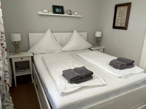 Strandvogt - wunderschöne Ferienwohnung mit Parkettboden und Sonnenbalkon