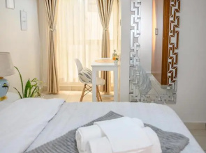 Furnished 1 Bedroom Apartment in Nairobi. 15 Mins to CBD. Free WI-FI & Parking