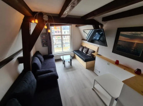 Appartement Havenzicht, gelegen aan zee met zeezicht