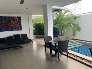 One World One Home Naiharn Hotel