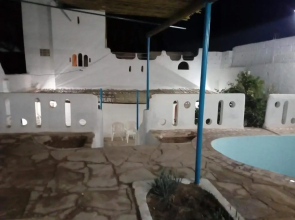 Tlat House