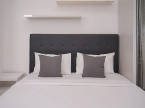 Comfortable and Warm Studio at Poris 88 Apartment