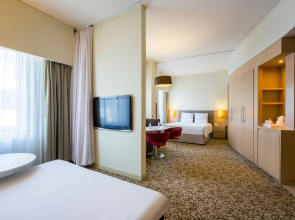Отель Novotel Suites Mall Avenue Dubai