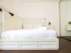 Minimalist Studio at Bassura City Apartment By Travelio