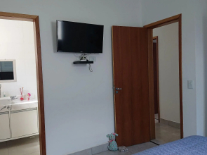 Linda Casa com Piscina Churrasqueira, Wifi em Massaguaçu Caraguatatuba/SP