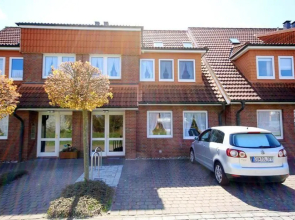 Ferienwohnung-10-mit-Balkon-Garten-Landhaus-Hubertus-Duhnen