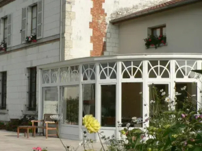 Chambre d'hôtes entre cour et jardin