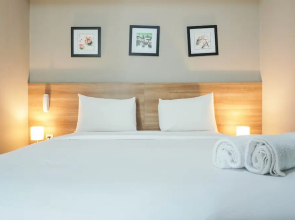 Elegant 1BR Apartment with Working Space Mustika Golf Residence