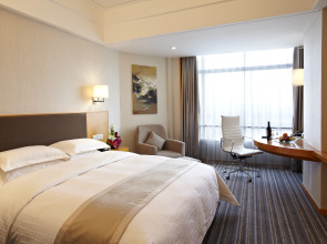 Отель Ramada Plaza by Wyndham Shanghai Pudong Airport