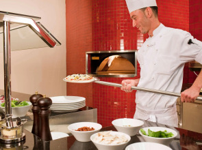 Отель Novotel Suites Mall Avenue Dubai