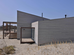 Luxurious villa with a nice deck, in nature reserve De Punt