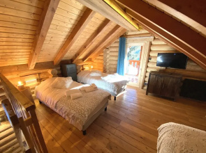 L'ours Blanc Chalet en Rondins