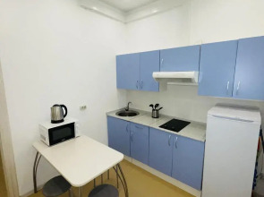 Апартаменты на Микрорайоне 1 Мая 4к1