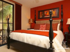 Luxe! Impressively designed 2nd-floor unit in Coco done in red and orange hues