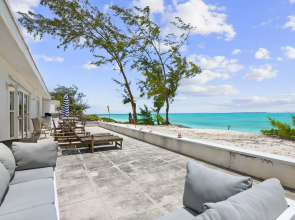 Beachfront White Palm Villa - Tar Bay