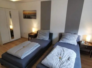 Frisch sanierte Ferienwohnung 2 min vom Südstrand - Balkon - PAY TV