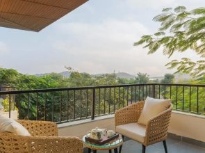SaffronStays Camelot by the Lake - 3BR villa with glass walls, TT, projector, and gardens, Udaipur